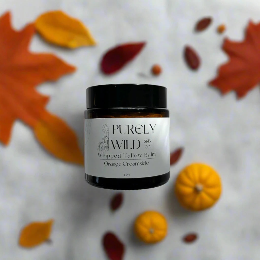 Jar of Purely Wild whipped tallow balm on a light background