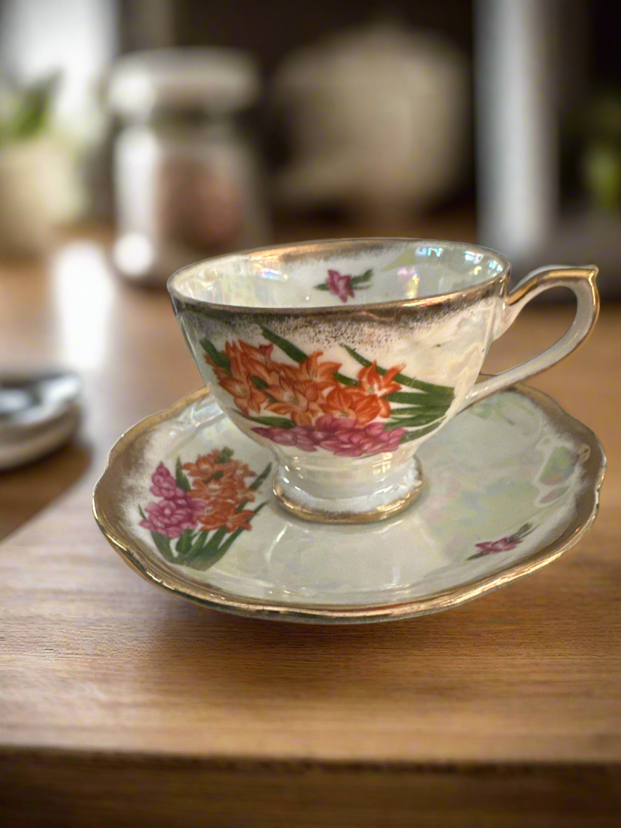 Hand-Painted Porcelain
Teacup and Saucer