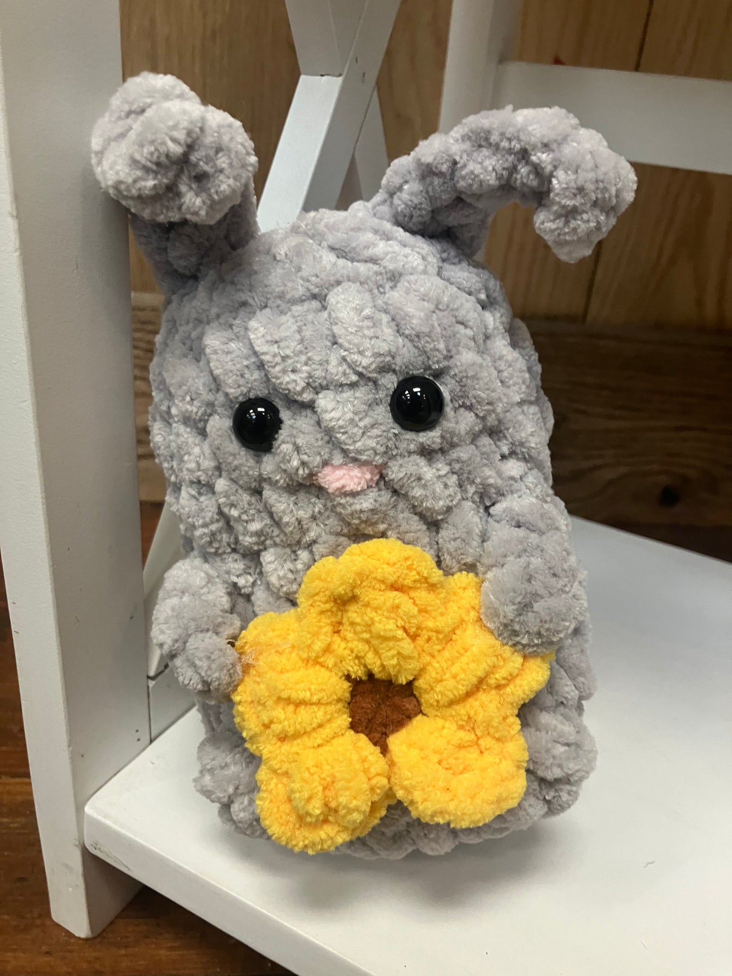 Bunny Holding a Daisy