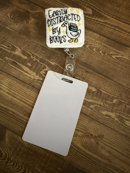 Easily Distracted by Books Badge Reel