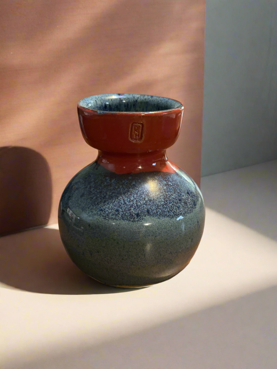 Glazed pottery vase