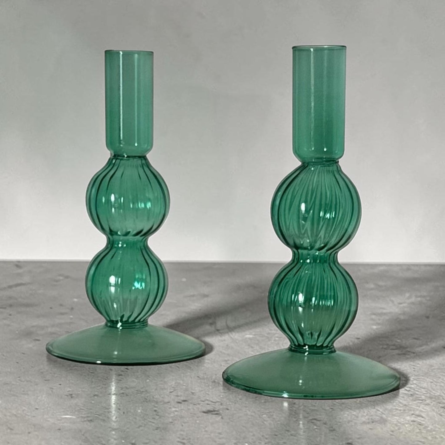 Colorful glass candlestick pair