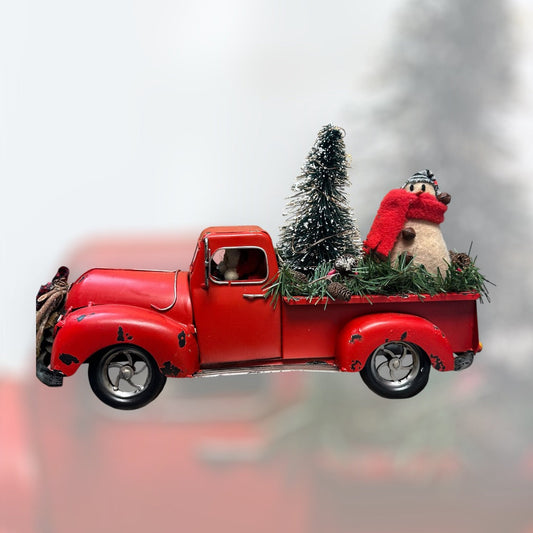 Red Truck with snow person