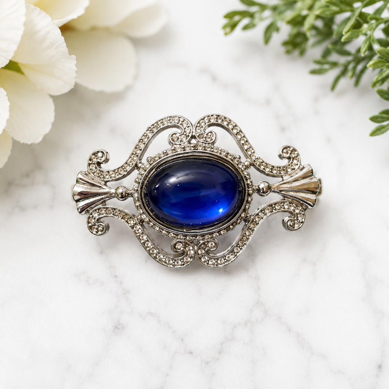 Vintage Silver Tone Blue Cabochon Rhinestone Scroll Brooch Pin
