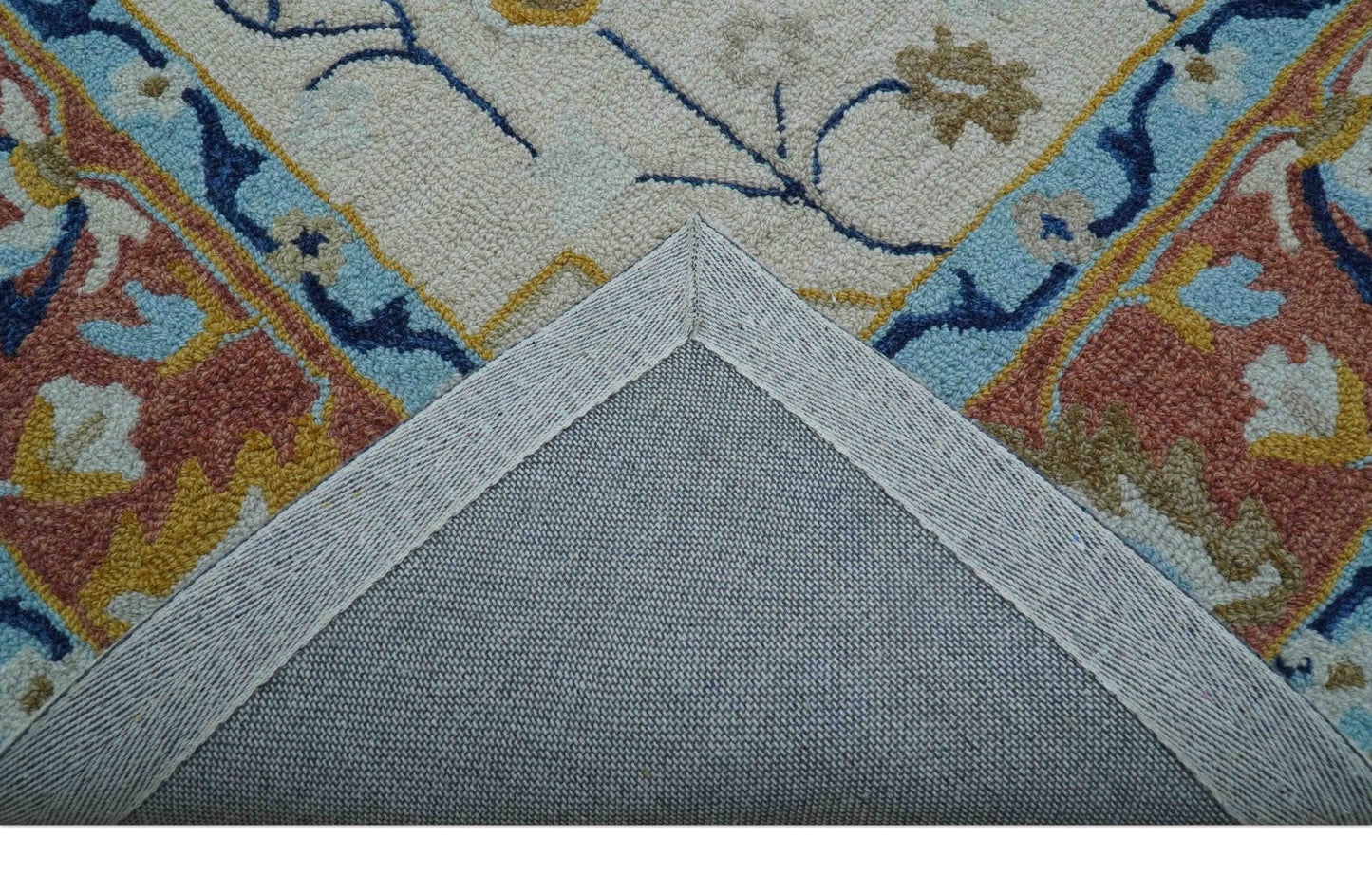 Ollie Traditional Blue And Ivory Hand Tufted Wool Rug